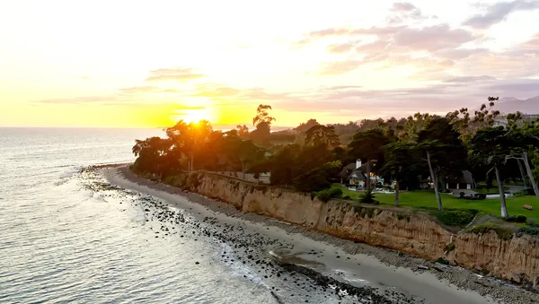 a view of a beach with an ocean beach