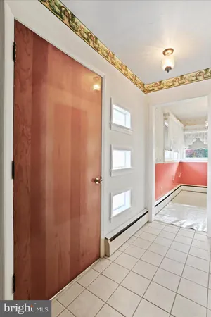 a kitchen with a refrigerator stove and a sink