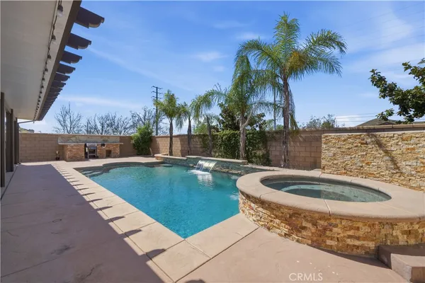 a house view with a backyard space