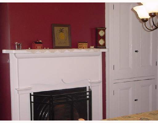 204 Anderson Road Butler, PA 16002 - Photo 3 of 8 Dining Room. hardwood flooring .. gas fireplace .. built-in hutch .. stained glass window over door