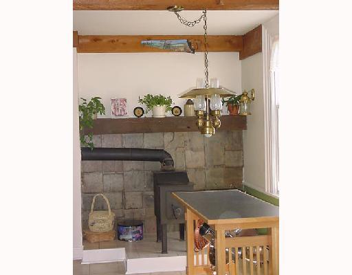 204 Anderson Road Butler, PA 16002 - Photo 4 of 8 Kitchen. Large eatin kitchen with wood stove .. ceramic tile flooring .. island with electric cooktop .. double-bowled stainless steel sink .. DW & Refrigerator included .. large venthood over cooktop