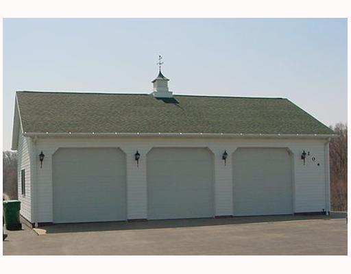 204 Anderson Road Butler, PA 16002 - Photo 7 of 8 Parking Lot/Garage. large 3-car detached garage .. insulated & heated (natural gas) .. has water + 220v service .. Garage doors are 10x10