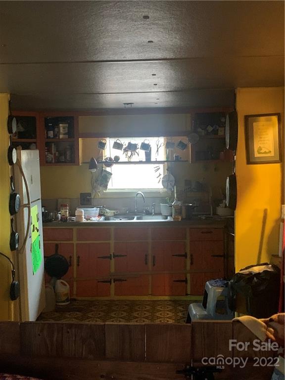 1390 Cove Road Rutherfordton, NC 28139 - Photo 11 of 15 a room with lots of different colored cloths