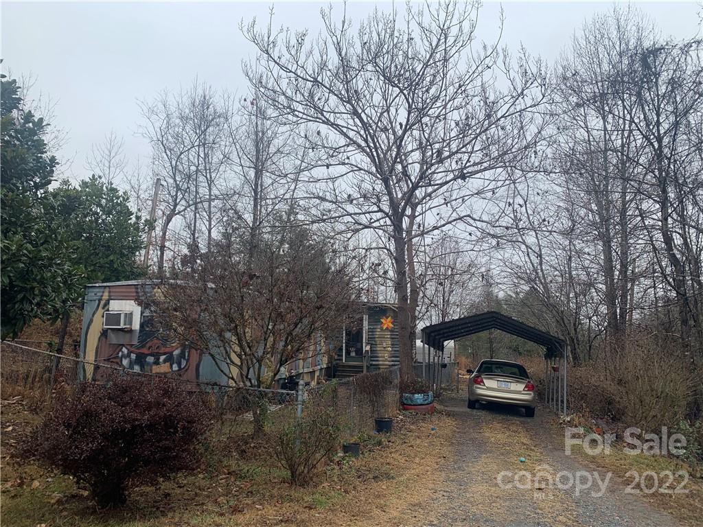 1390 Cove Road Rutherfordton, NC 28139 - Photo 2 of 15 a view of street with parked cars
