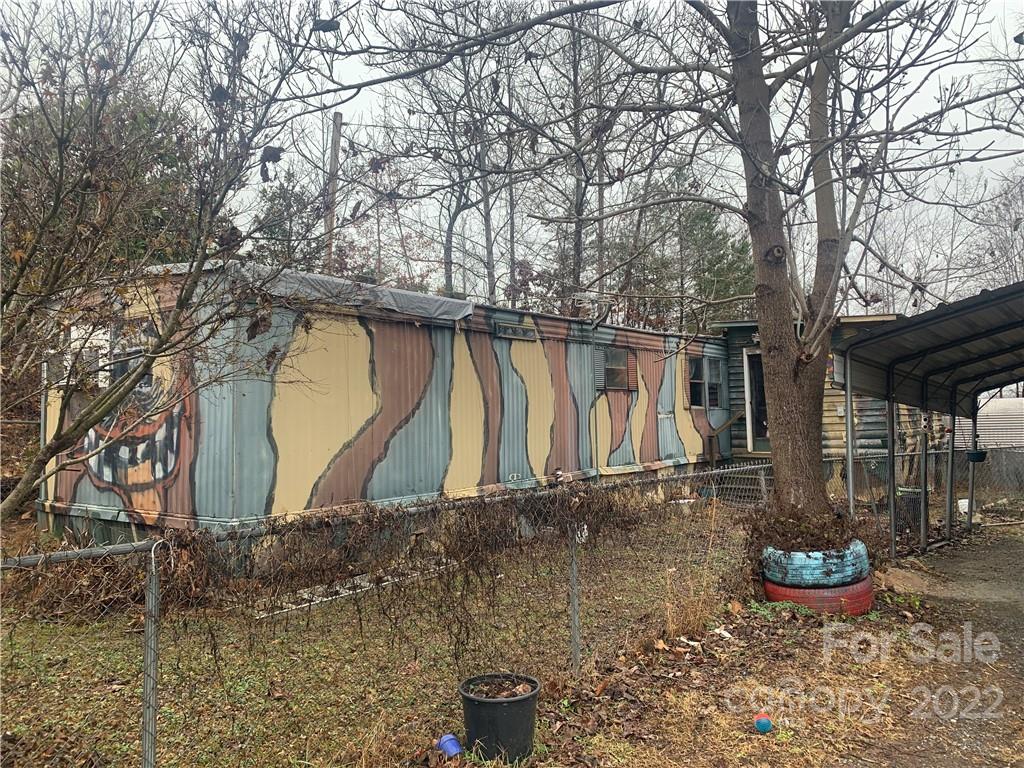 1390 Cove Road Rutherfordton, NC 28139 - Photo 7 of 15 a backyard of a house with lots of green space