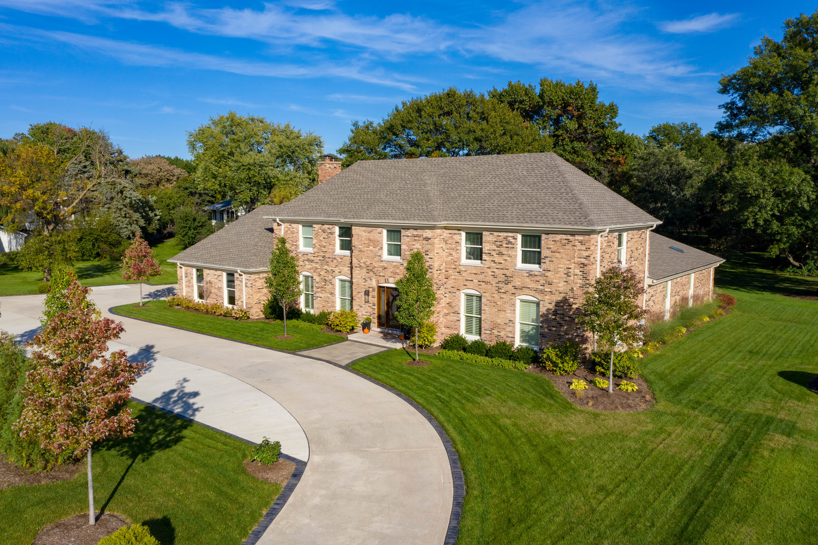 2801 Meyers Road Oak Brook, IL 60523 - Photo 1 of 48 a front view of a house with a yard