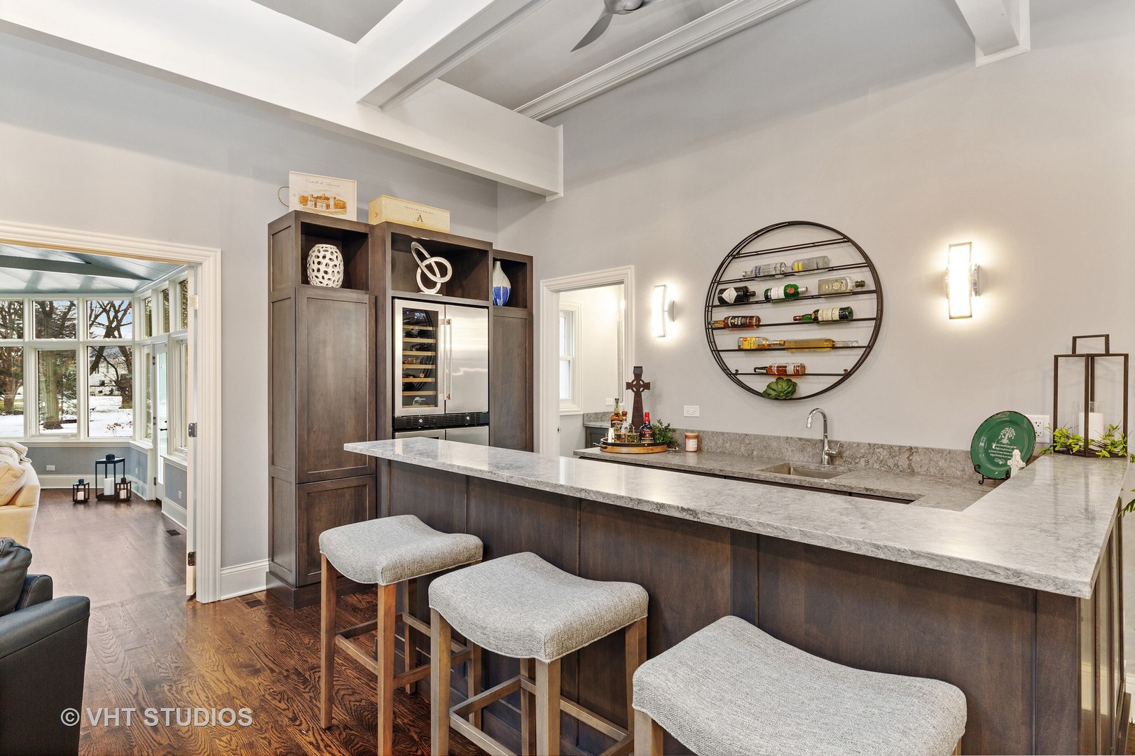 2801 Meyers Road Oak Brook, IL 60523 - Photo 12 of 48 a dining room with wooden floor and chandelier