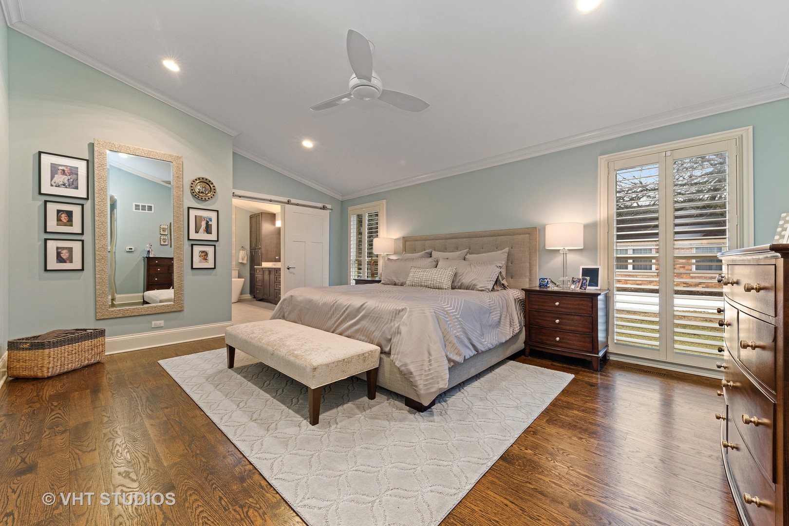 2801 Meyers Road Oak Brook, IL 60523 - Photo 20 of 48 a spacious bedroom with a large bed and a couch