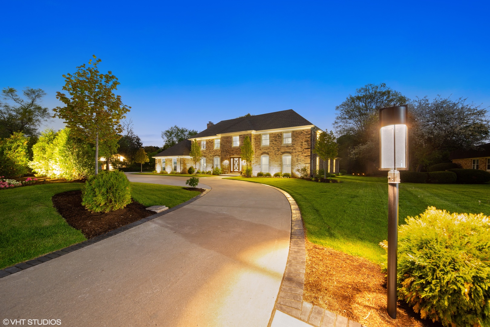 2801 Meyers Road Oak Brook, IL 60523 - Photo 2 of 48 a view of a house with a yard