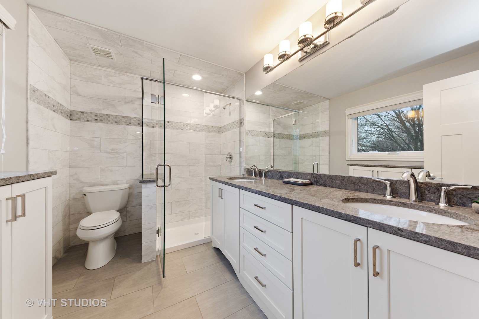 2801 Meyers Road Oak Brook, IL 60523 - Photo 29 of 48 a bathroom with a granite countertop sink mirror vanity and toilet