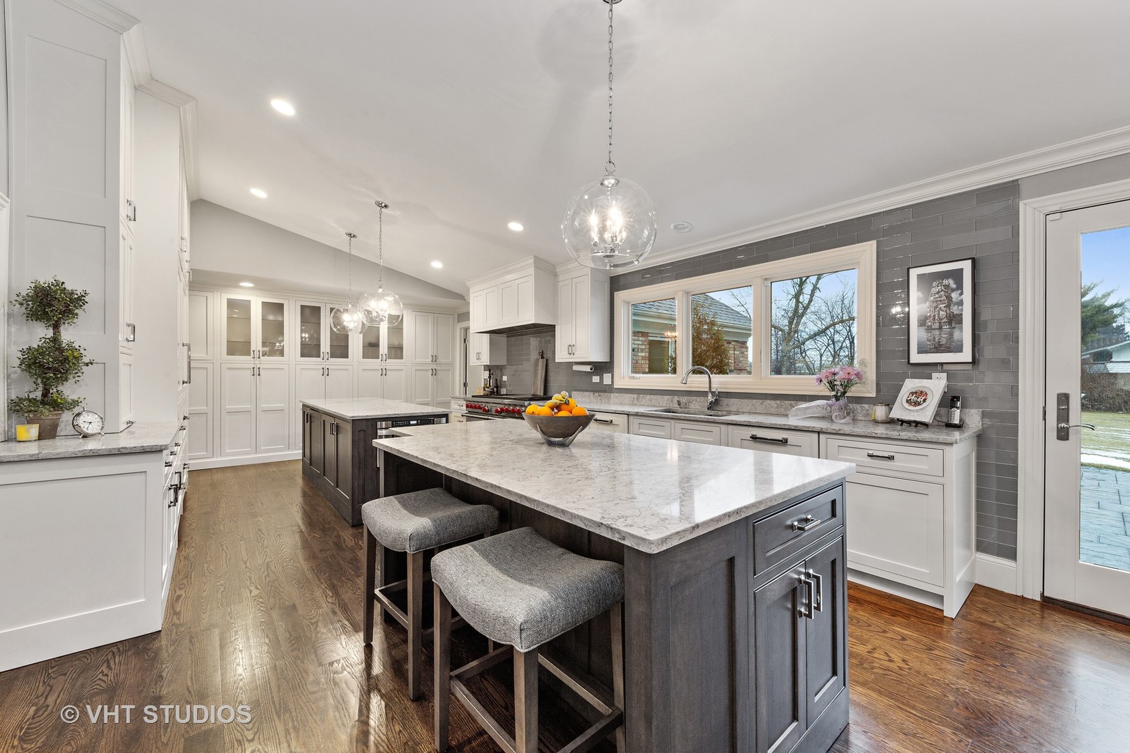 2801 Meyers Road Oak Brook, IL 60523 - Photo 3 of 48 a kitchen with a table chairs stove and cabinets