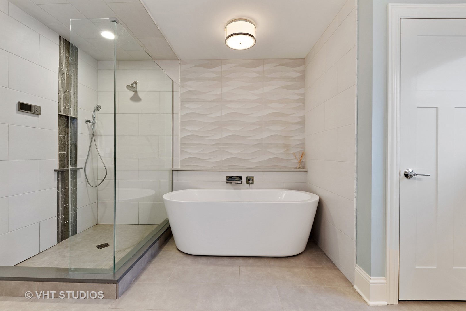 2801 Meyers Road Oak Brook, IL 60523 - Photo 33 of 48 a bathroom with a bathtub and shower