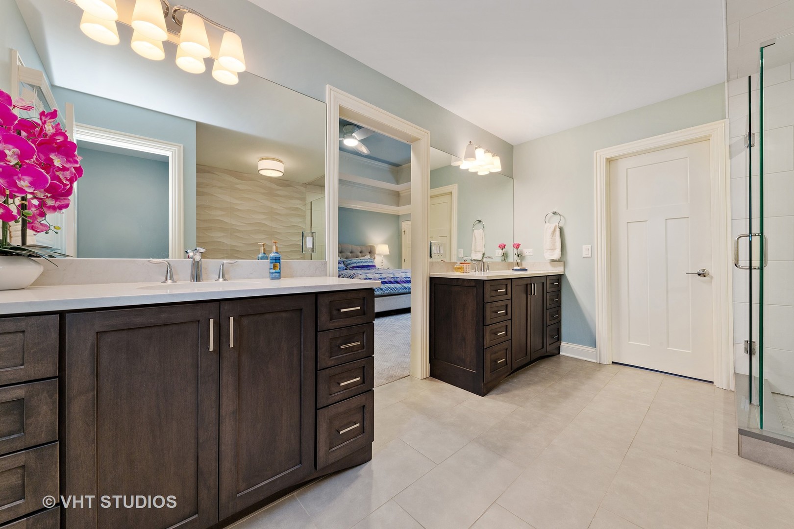 2801 Meyers Road Oak Brook, IL 60523 - Photo 34 of 48 a bathroom with a sink vanity and a mirror
