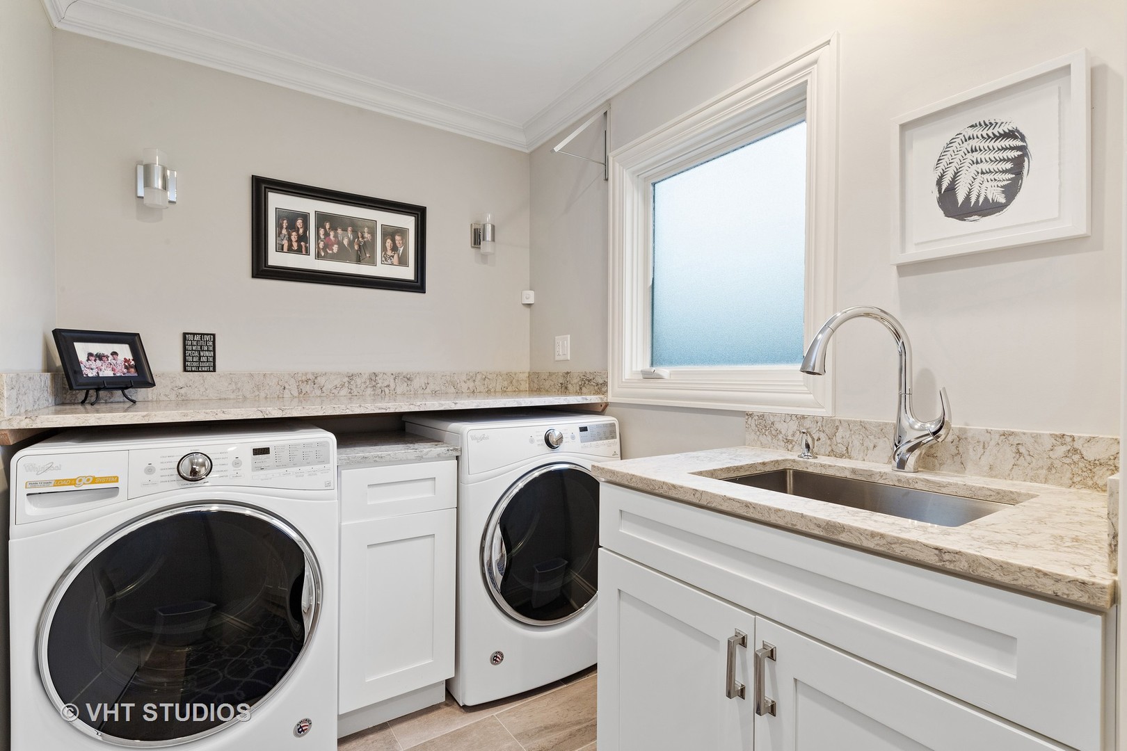 2801 Meyers Road Oak Brook, IL 60523 - Photo 35 of 48 a close view of a sink and a washer dryer