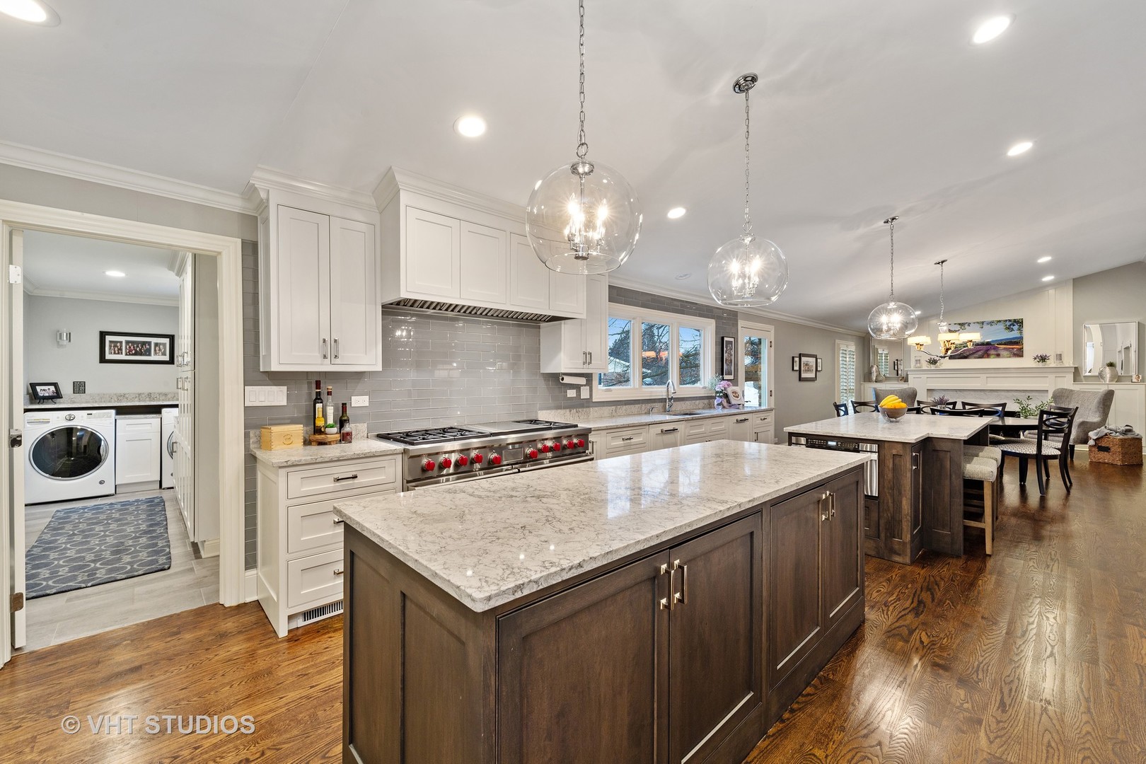 2801 Meyers Road Oak Brook, IL 60523 - Photo 4 of 48 a kitchen with stainless steel appliances granite countertop a sink a stove and a refrigerator