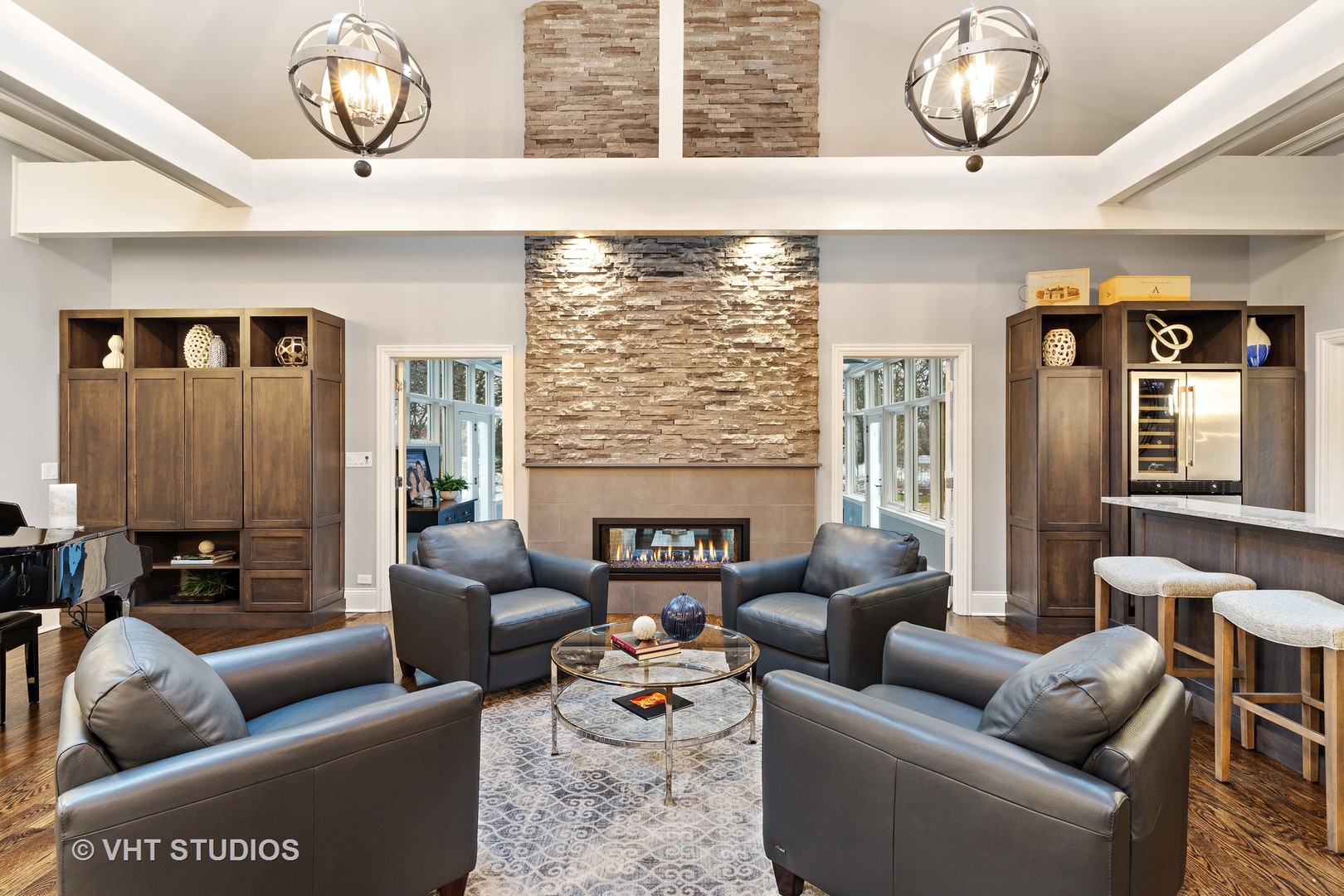 2801 Meyers Road Oak Brook, IL 60523 - Photo 9 of 48 a living room with furniture a fireplace and a large window