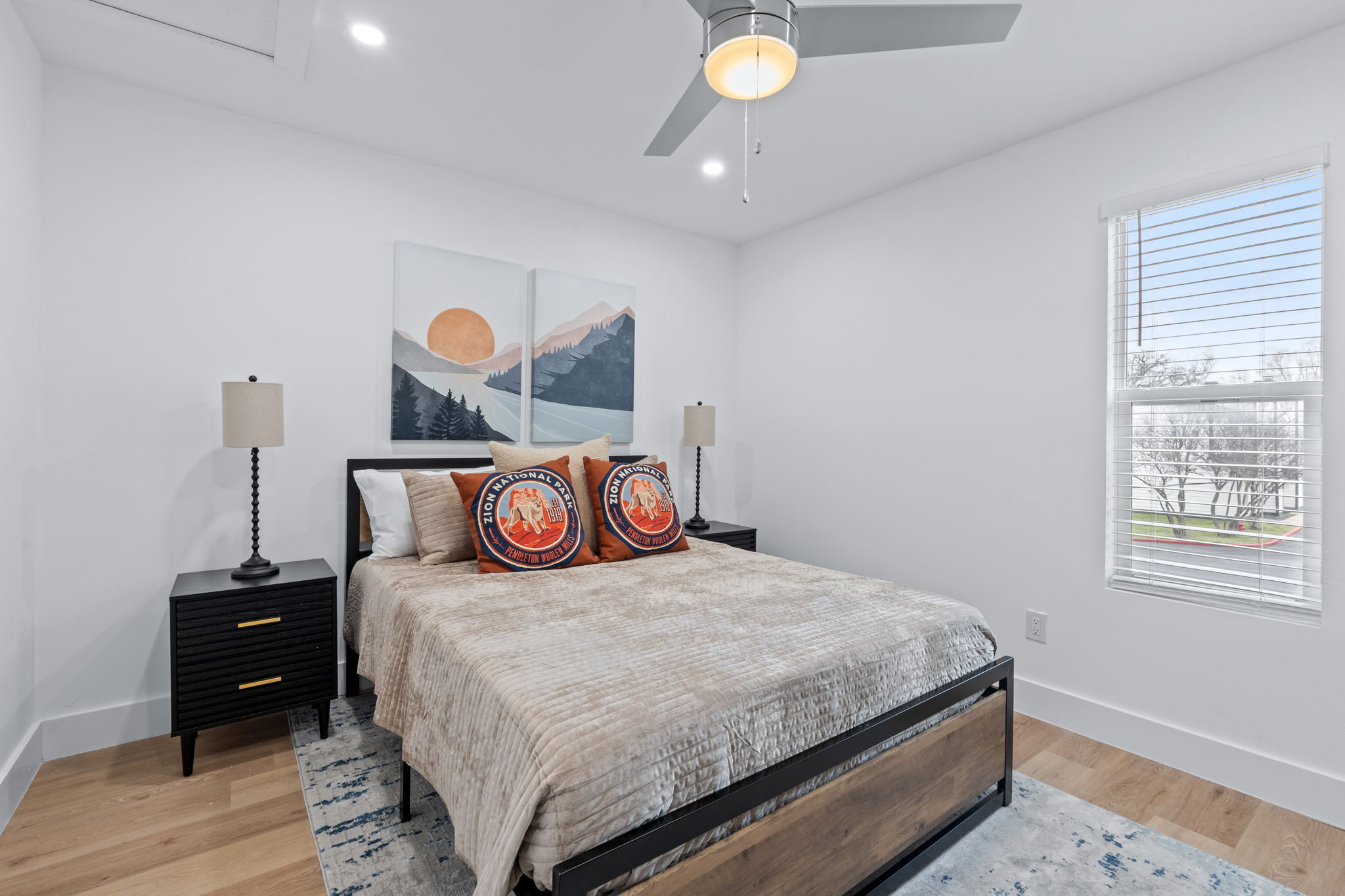 2706 Wheless Lane, Unit 101 Austin, TX 78723 - Photo 13 of 24 a bedroom with a bed and a window