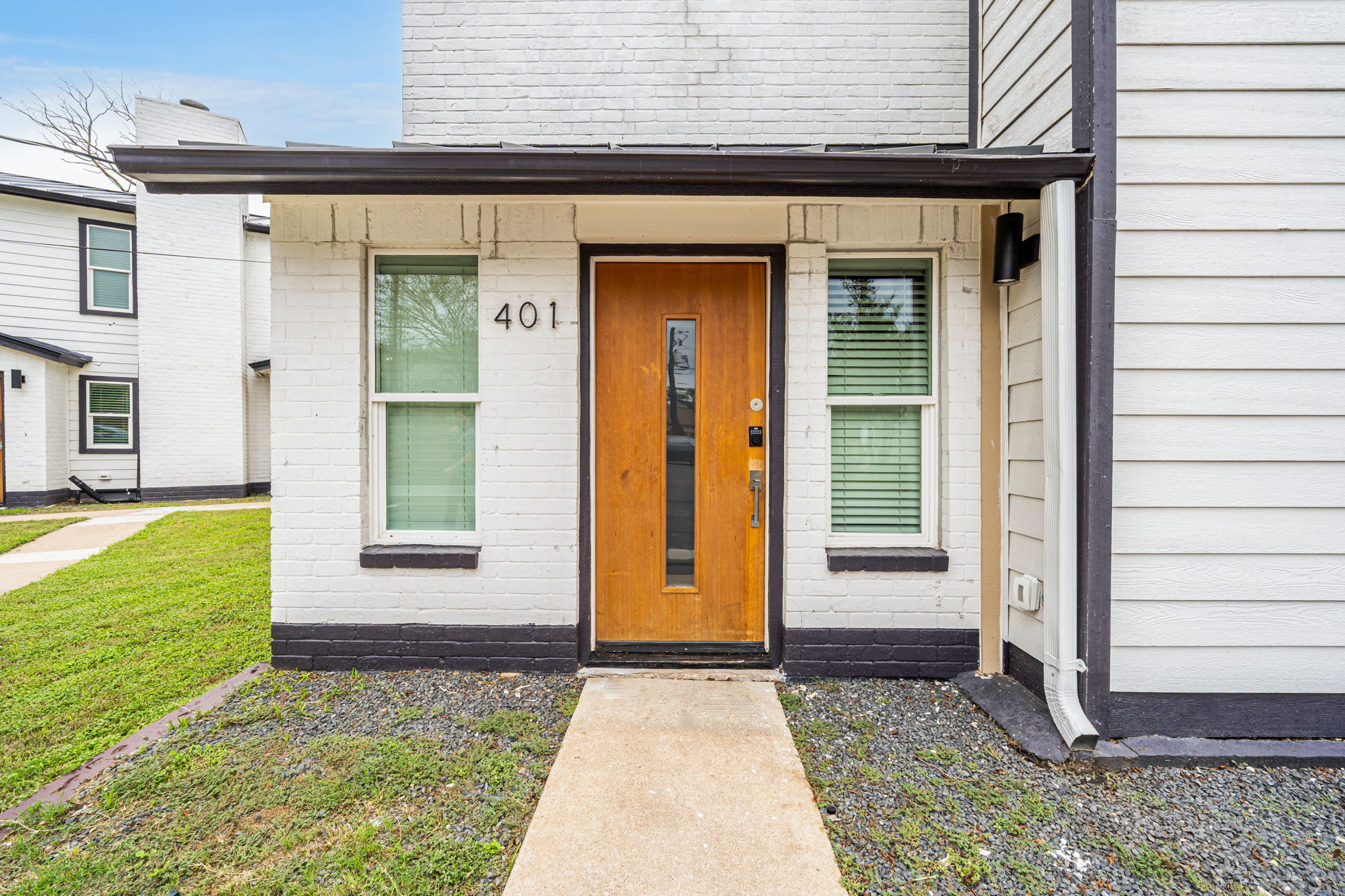 2706 Wheless Lane, Unit 101 Austin, TX 78723 - Photo 2 of 24 a view of a entryway door front of a house
