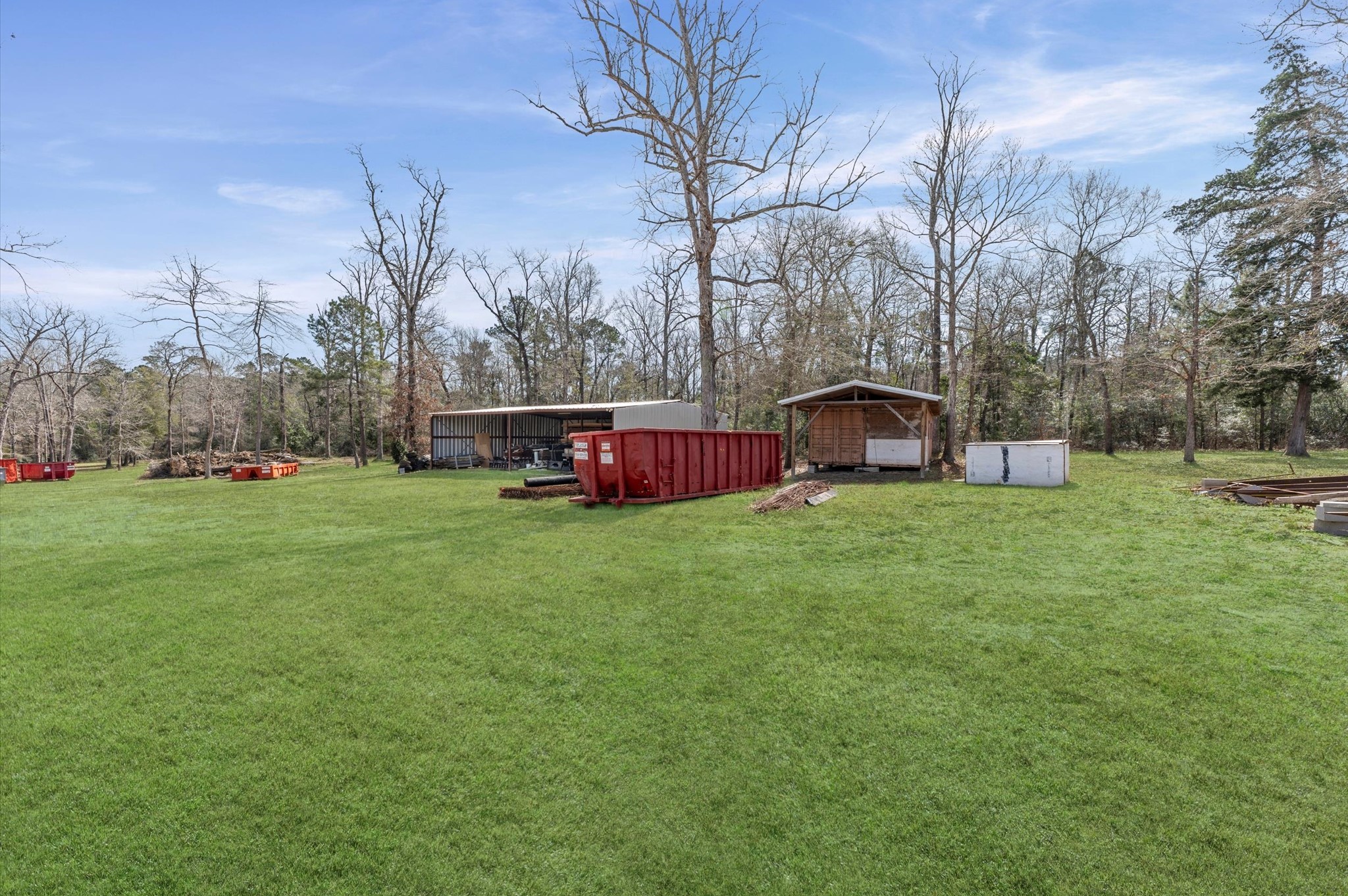 2504 Oak Ridge Road Willis, TX 77378 - Photo 1 of 10 a view of a house with a backyard