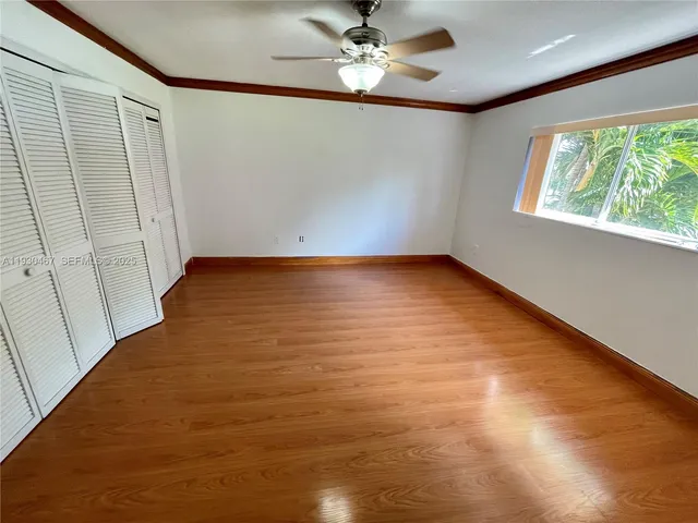 a bathroom with a shower and a toilet