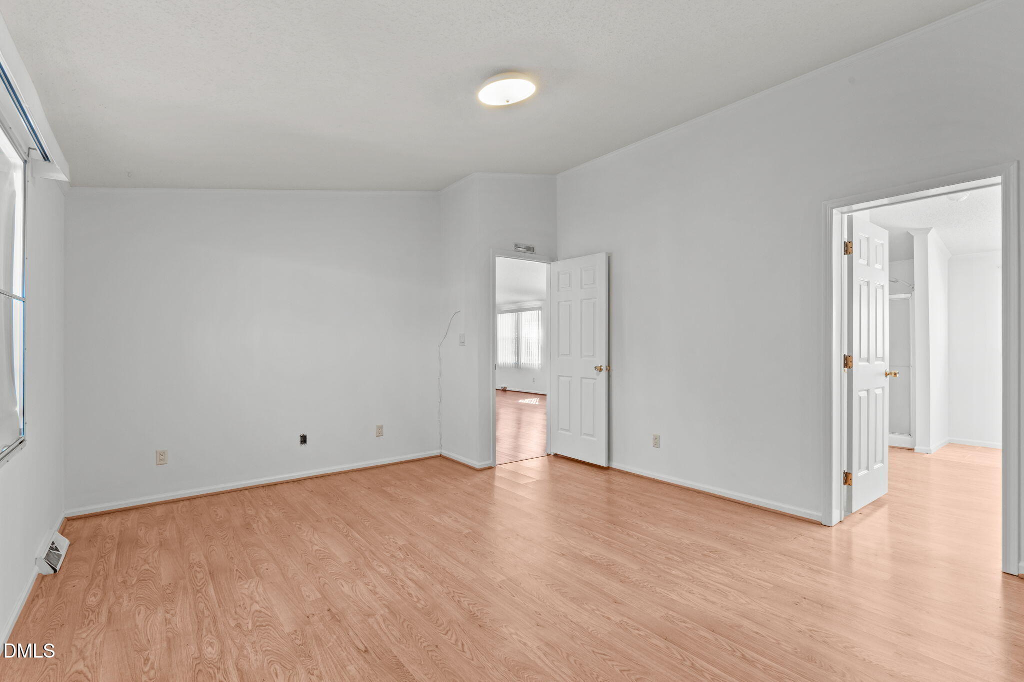 7900 Barbour Store Road Willow Spring, NC 27592 - Photo 14 of 38 Doors to hall and ensuite.