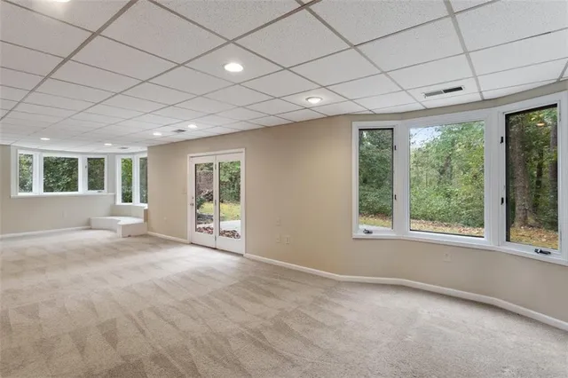 an aerial view of residential houses with outdoor and green space