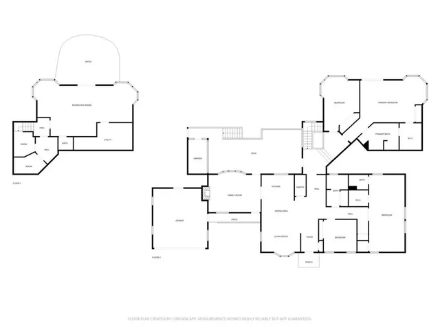 a living room with furniture a fireplace and a large window