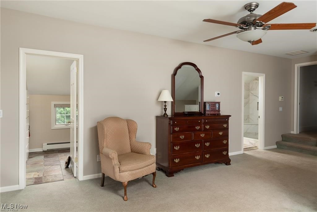 644 Riverside Drive Painesville, OH 44077 - Photo 23 of 48 Sitting room with a baseboard heating unit, carpet, baseboards, and ceiling fan
