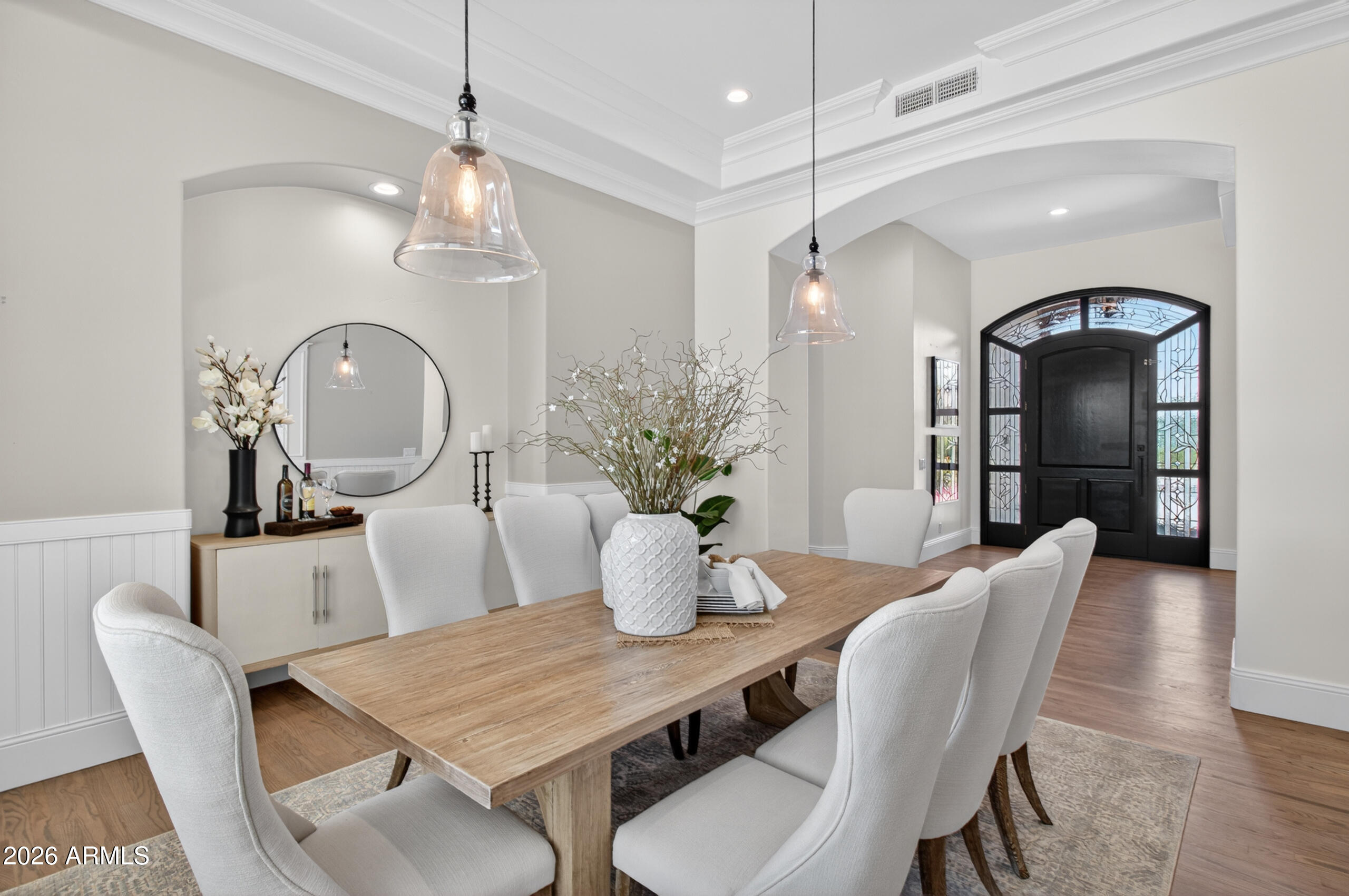 2677 East Queen Creek Road Gilbert, AZ 85297 - Photo 17 of 128 a view of a dining room with furniture and wooden floor