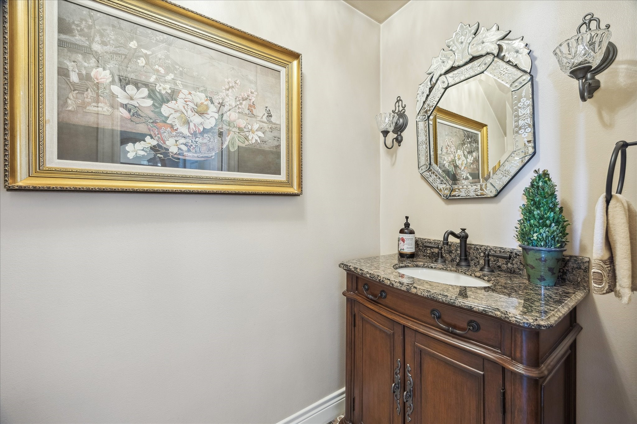 2435 North Boulevard Houston, TX 77098 - Photo 13 of 25 a bathroom with a granite countertop sink and a mirror