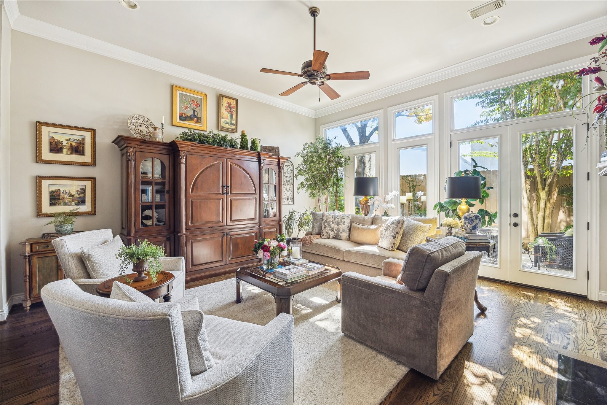 2435 North Boulevard Houston, TX 77098 - Photo 7 of 25 a living room with furniture a ceiling fan and a window