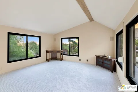 a very nice looking dining room with a table and chairs