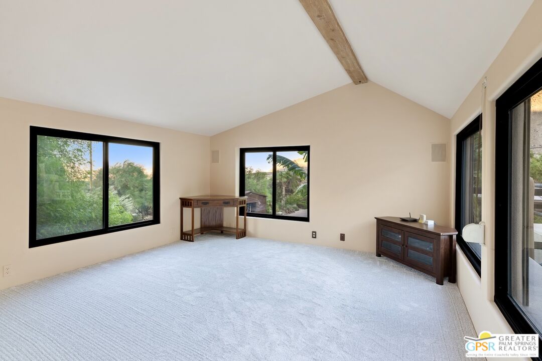 15911 Falls Creek Road Whitewater, CA 92282 - Photo 17 of 61 a view of an empty room with furniture and a window