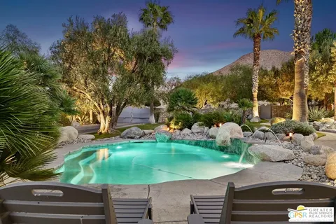 a view of a city with mountains in the background