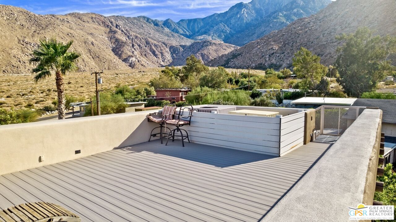 15911 Falls Creek Road Whitewater, CA 92282 - Photo 49 of 61 a view of a patio with two chairs and a table