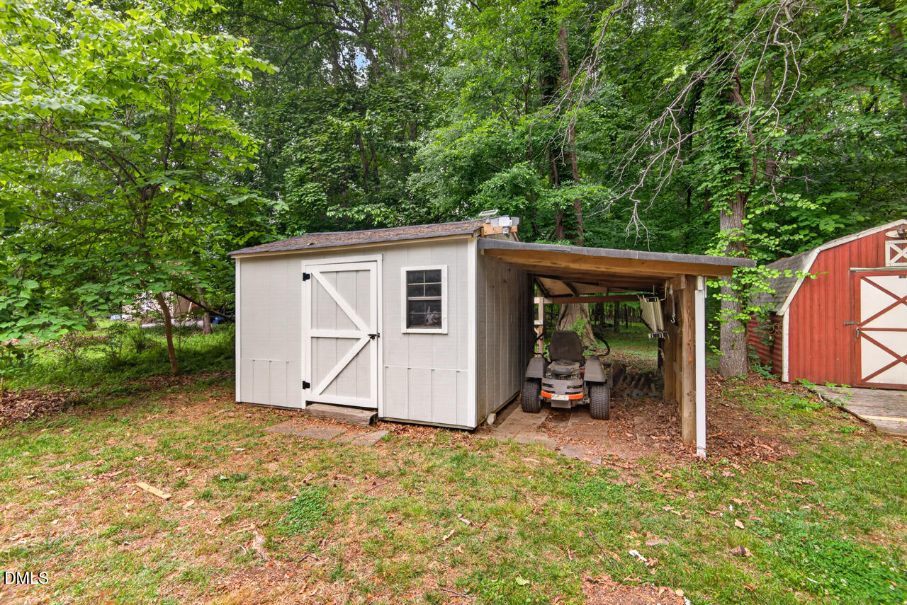 1420 Goodwin Road Durham, NC 27712 - Photo 38 of 54 a view of a house with backyard