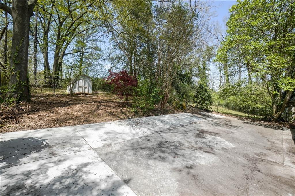 444 Fairburn Road Northwest Atlanta, GA 30331 - Photo 21 of 21 a view of a yard with trees