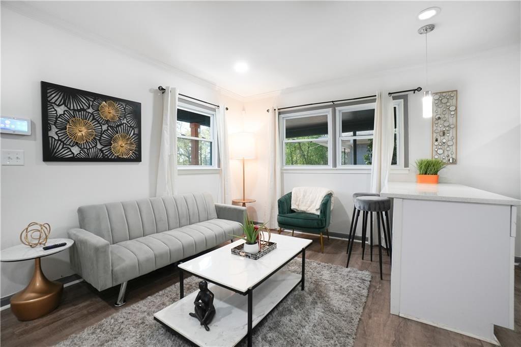 444 Fairburn Road Northwest Atlanta, GA 30331 - Photo 4 of 21 a living room with furniture and a window