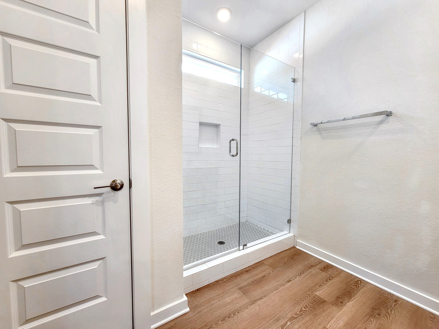 2329 Gabriels Horn Road Leander, TX 78641 - Photo 11 of 23 A well-appointed shower space features a sleek glass enclosure and contemporary subway tile.