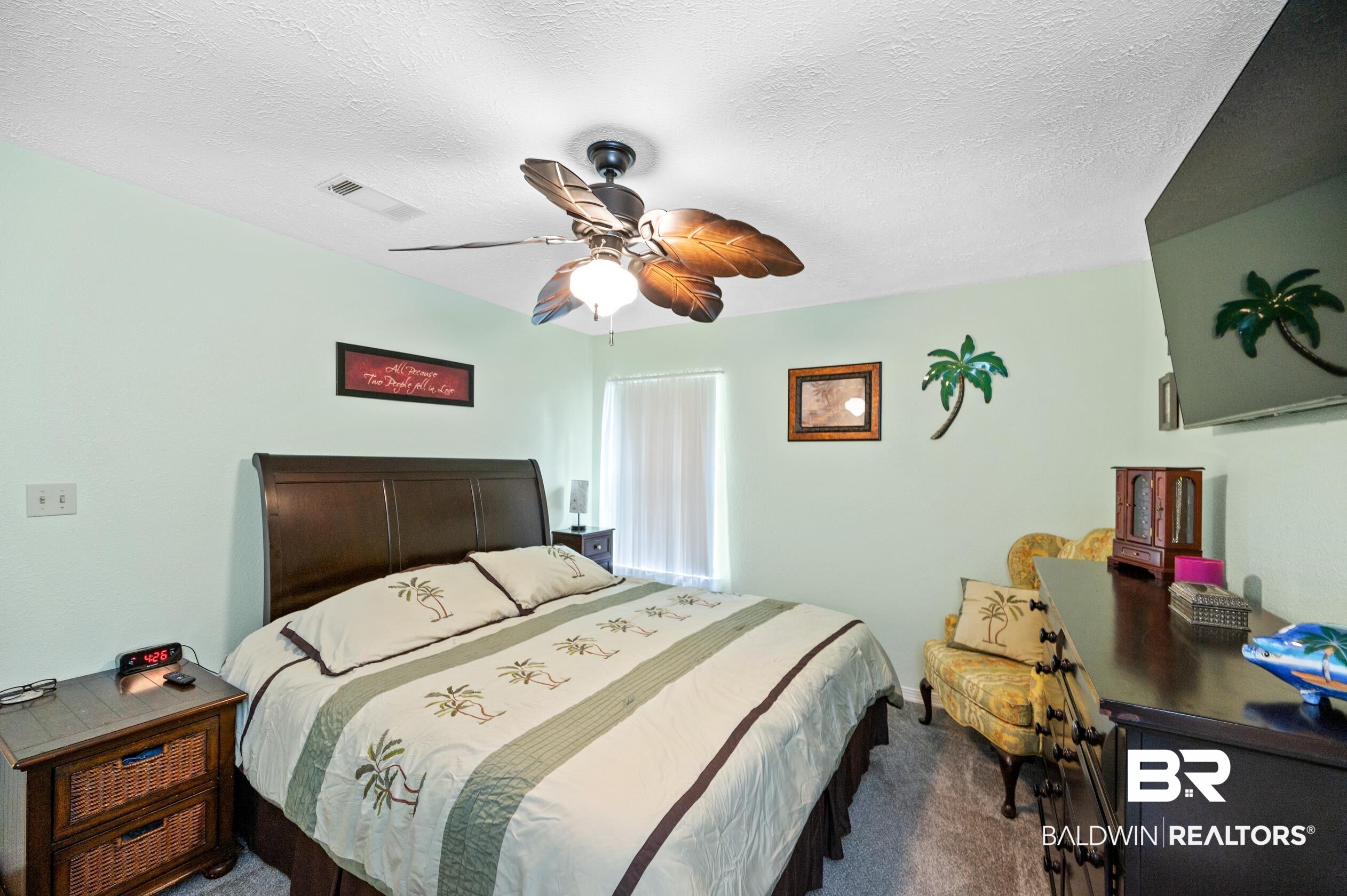 2772 Santa Rosa Circle Lillian, AL 36549 - Photo 16 of 50 Bedroom with a textured ceiling, carpet, and ceiling fan