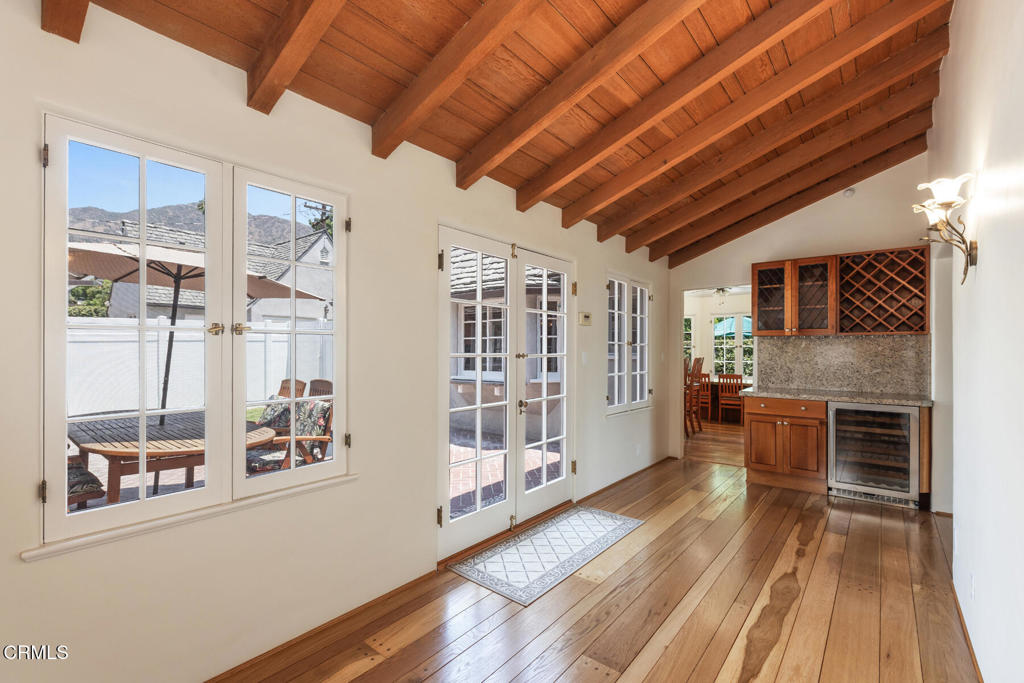 369 West Kenneth Road Glendale, CA 91202 - Photo 13 of 36 a view of a livingroom with wooden floor and a fireplace