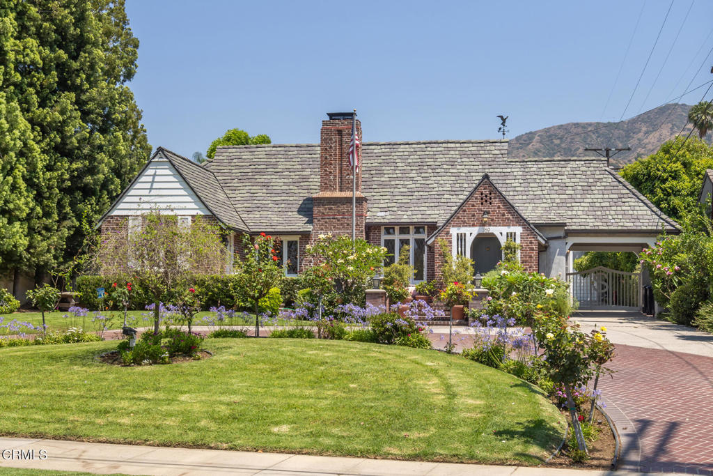 369 West Kenneth Road Glendale, CA 91202 - Photo 2 of 36 front view of house with a yard