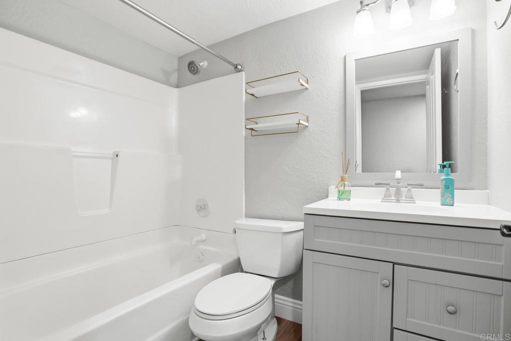 391 Via Almansa Encinitas, CA 92024 - Photo 18 of 35 a bathroom with a sink a toilet and shower
