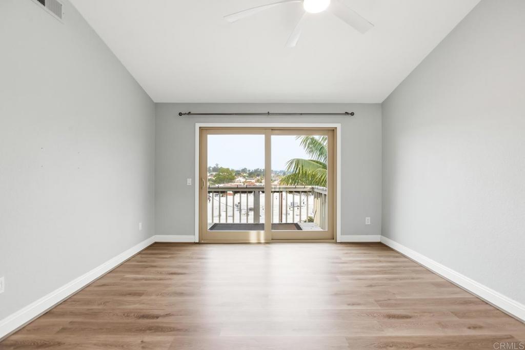391 Via Almansa Encinitas, CA 92024 - Photo 19 of 35 wooden floor in an empty room with a window