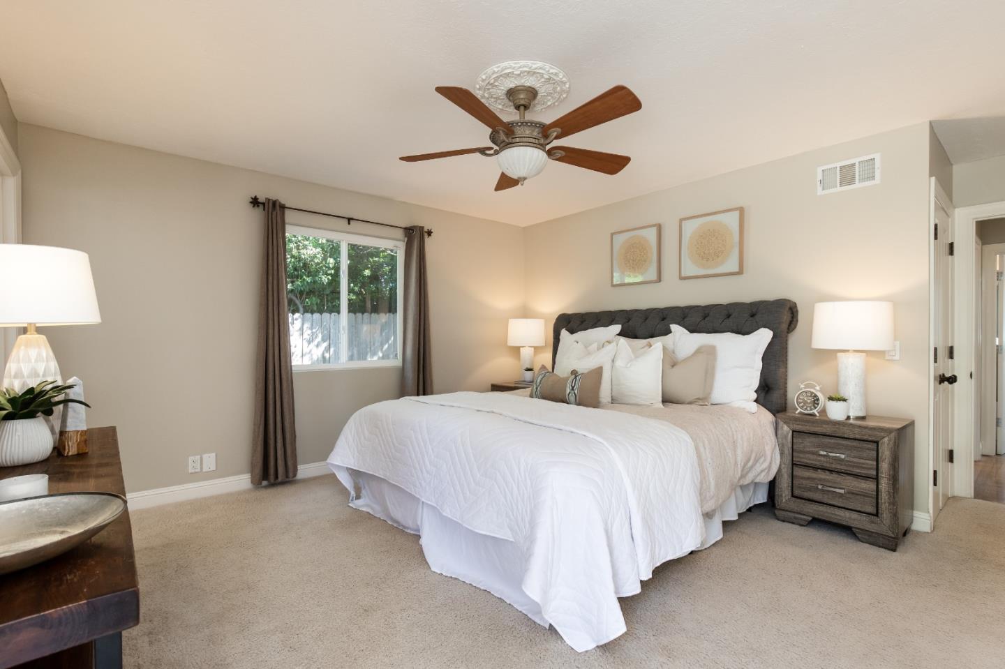 356 Barbara Way Hillsborough, CA 94010 - Photo 16 of 37 a bedroom with bed and window