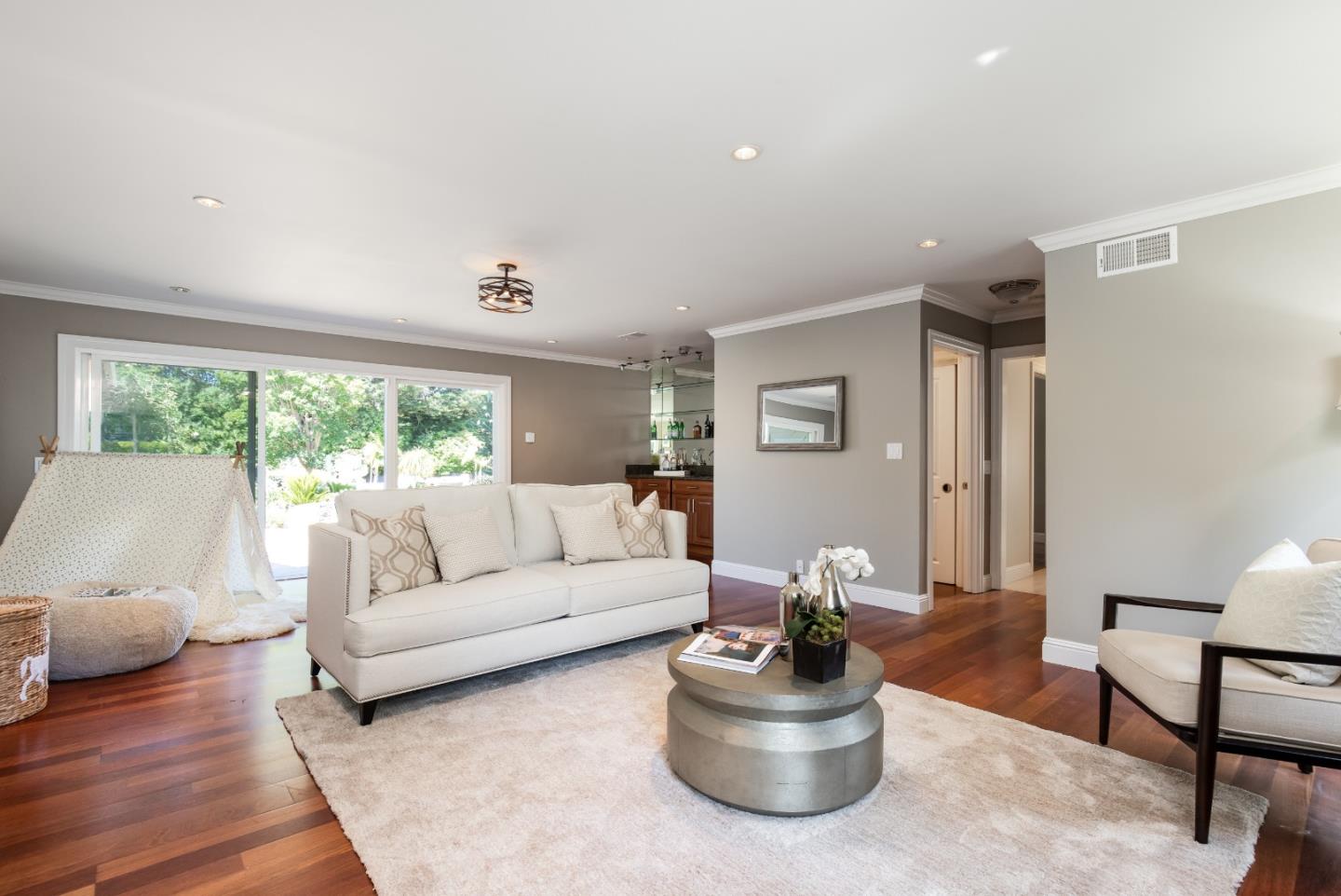 356 Barbara Way Hillsborough, CA 94010 - Photo 20 of 37 a living room with furniture and a large window