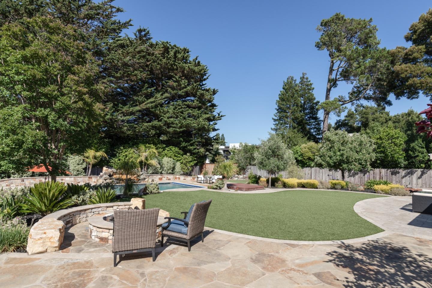 356 Barbara Way Hillsborough, CA 94010 - Photo 29 of 37 a view of a swimming pool and lounge chairs