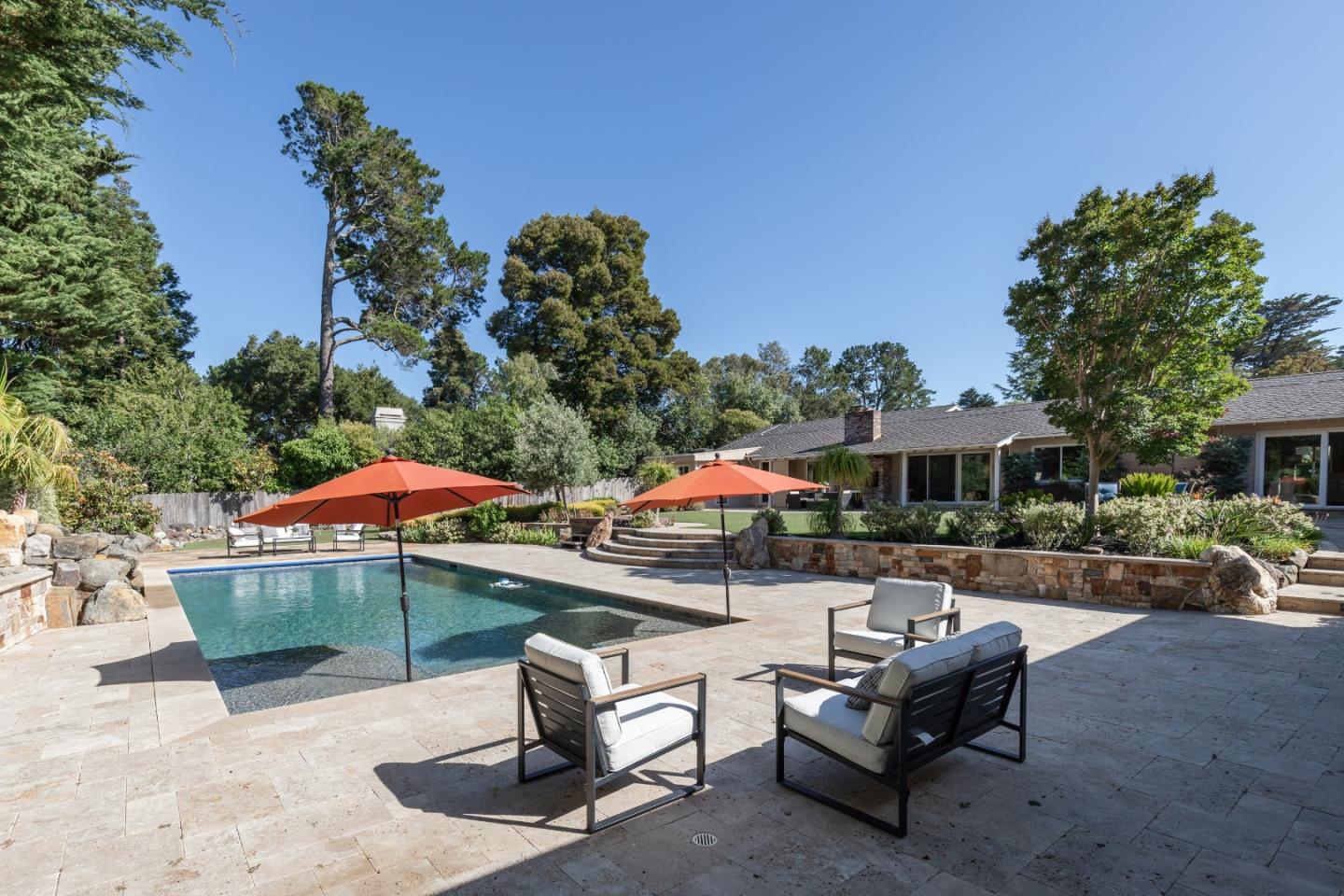 356 Barbara Way Hillsborough, CA 94010 - Photo 32 of 37 a view of a backyard with a patio and outdoor seating