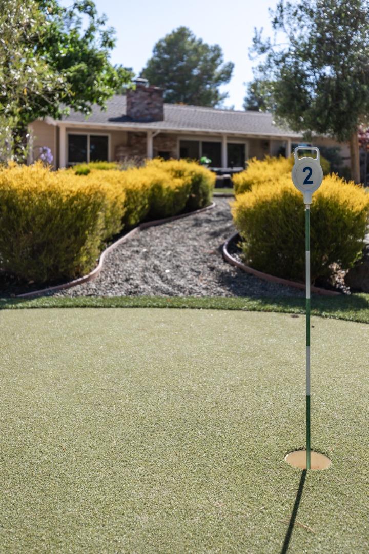 356 Barbara Way Hillsborough, CA 94010 - Photo 35 of 37 a front view of a house with a yard