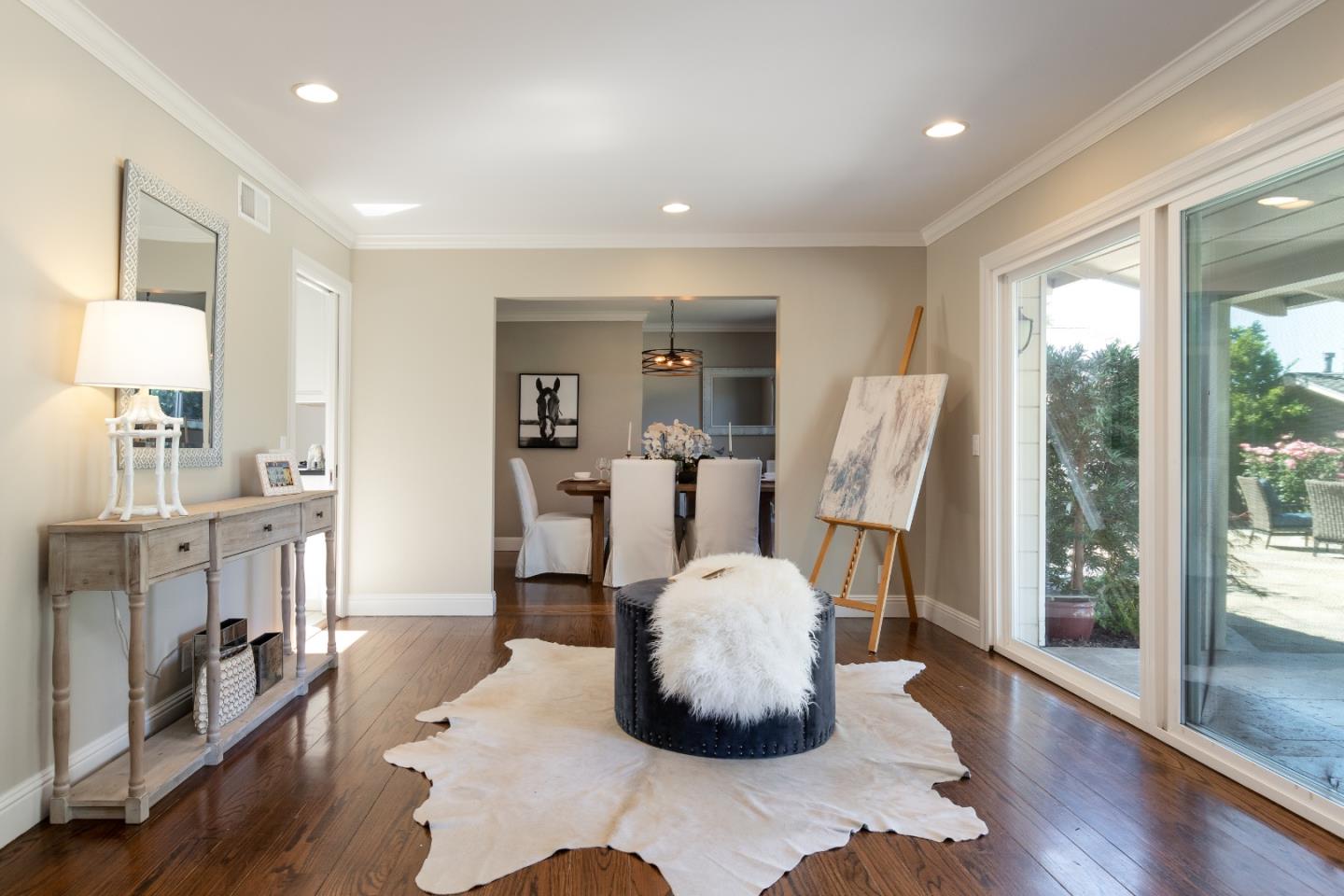 356 Barbara Way Hillsborough, CA 94010 - Photo 6 of 37 a living room with furniture and a wooden floor